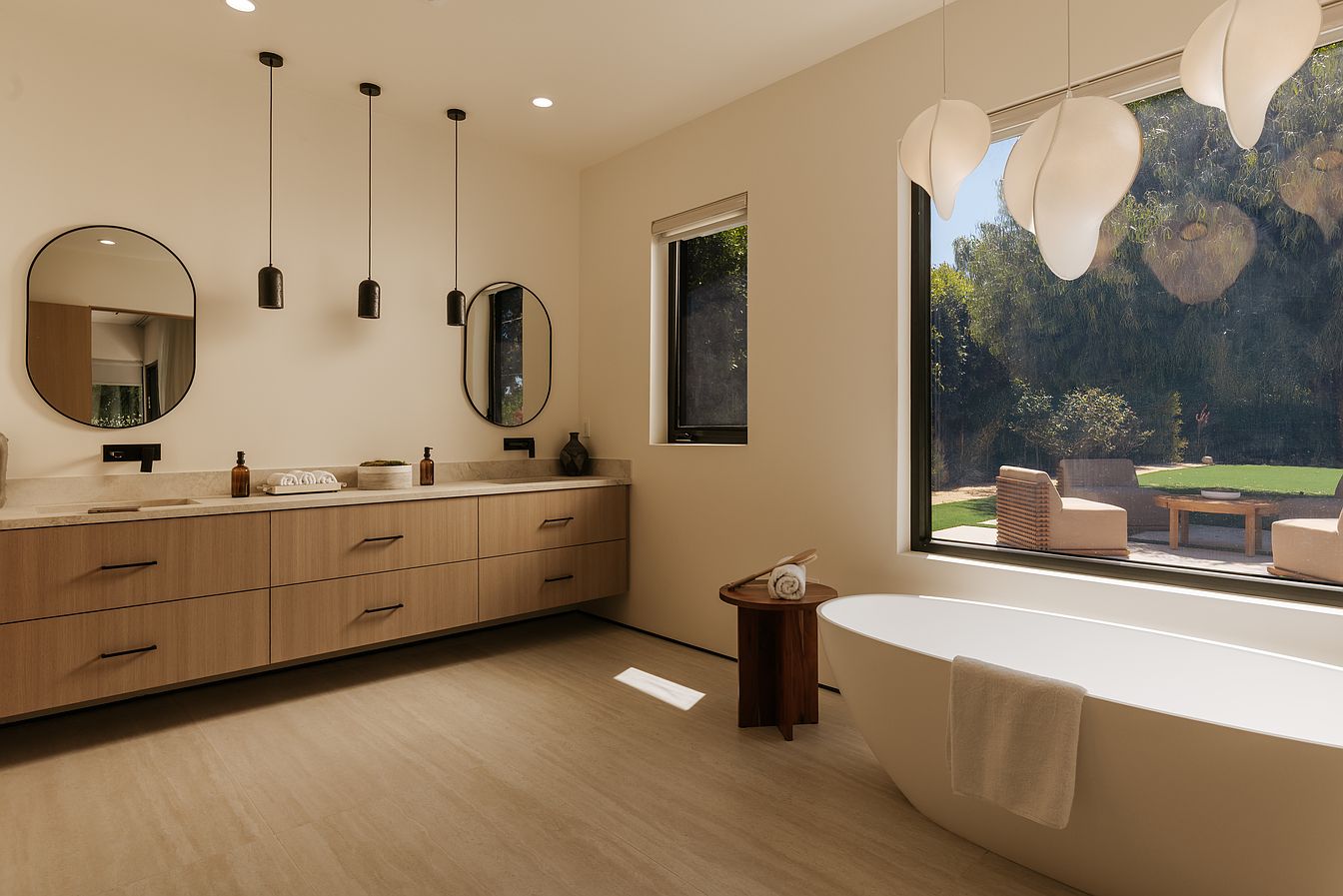 Wall-mounted faucets above integrated vanity basins. — Casa Serena